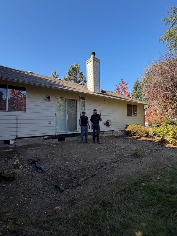 Backyard deck tear-out by Classic Cleanouts (after)